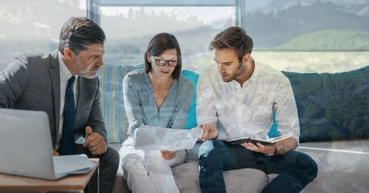 infrastructure_bill_blog people gathered around couch looking at documents